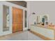 Bright foyer with stylish rug, light fixture and wood-look flooring at 2011 W Calle De Las Estrella --, Phoenix, AZ 85085