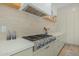 Modern kitchen featuring sleek cabinetry, stainless steel appliances and a stylish range hood at 2011 W Calle De Las Estrella --, Phoenix, AZ 85085