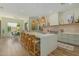 Beautiful kitchen featuring a large island with bar seating, stainless steel appliances and modern lighting at 2011 W Calle De Las Estrella --, Phoenix, AZ 85085
