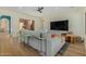 Modern living room with hardwood floors, comfortable seating, and large windows at 2011 W Calle De Las Estrella --, Phoenix, AZ 85085