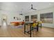 Open living space with seating area, a game table, and natural light at 2011 W Calle De Las Estrella --, Phoenix, AZ 85085