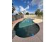 A stunning backyard pool with rock features offers a refreshing oasis for relaxation and enjoyment at 20275 N 81St Ln, Peoria, AZ 85382