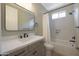 Bright bathroom featuring a new countertop, a toilet, and a new shower/bath at 20834 W Prospector Way, Buckeye, AZ 85396