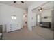 Bright bedroom featuring a mirrored closet and soft carpet for a welcoming space at 20834 W Prospector Way, Buckeye, AZ 85396