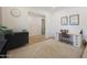 Bright home office featuring a modern desk setup and neutral design elements at 20834 W Prospector Way, Buckeye, AZ 85396