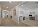 Bright home office with two desks, beige rug, and elegant decor at 20834 W Prospector Way, Buckeye, AZ 85396