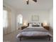 Bright main bedroom featuring a modern bed frame, ensuite bath, and lots of natural light at 20834 W Prospector Way, Buckeye, AZ 85396