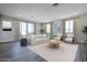 Open-concept living room features recessed lighting, many windows, and neutral-toned furniture and decor at 2121 W Sonoran Desert Dr # 43, Phoenix, AZ 85085