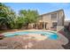 Backyard pool featuring a large patio area, perfect for outdoor entertaining and relaxation at 2323 W Hunter Ct, Phoenix, AZ 85085