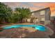 Backyard pool featuring a large patio area, perfect for outdoor entertaining and relaxation at 2323 W Hunter Ct, Phoenix, AZ 85085