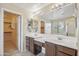 The primary bathroom has double sinks and a separate walk-in closet at 2323 W Hunter Ct, Phoenix, AZ 85085