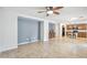 Open-concept living room with tile flooring and plenty of natural light at 2323 W Hunter Ct, Phoenix, AZ 85085