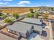 New construction single Gathering home with desert landscaping and a gray tile roof in a suburban neighborhood at 2512 N Pony Ln, Casa Grande, AZ 85122