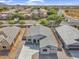 New construction single Gathering home with desert landscaping and a gray tile roof in a suburban neighborhood at 2512 N Pony Ln, Casa Grande, AZ 85122