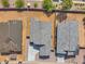 Birds eye view of new construction single Gathering home with desert landscaping and a gray tile roof at 2512 N Pony Ln, Casa Grande, AZ 85122