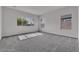 This bedroom features plush carpet and an array of windows for natural light at 2512 N Pony Ln, Casa Grande, AZ 85122