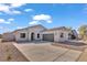 Beautiful single-story home featuring a well-maintained yard and a two-car garage at 2512 N Pony Ln, Casa Grande, AZ 85122