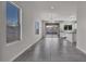 Living room area featuring recessed lights, tile floor, and a kitchen view at 2512 N Pony Ln, Casa Grande, AZ 85122