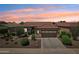 Beautiful home featuring lush landscaping, a spacious driveway, and a two-car garage at 27320 N 127Th Dr, Peoria, AZ 85383