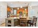 The kitchen features a granite island countertop and recessed lighting above the cabinets at 27320 N 127Th Dr, Peoria, AZ 85383