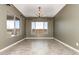 Dining room with chandelier and a window with a beautiful mountain view at 27537 W Yukon Dr, Buckeye, AZ 85396