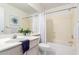 Well-lit bathroom with a tub and a vanity with ample counter space at 280 W Sheffield Ave, Gilbert, AZ 85233