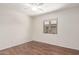 Cozy bedroom with wood-look floors and natural light at 280 W Sheffield Ave, Gilbert, AZ 85233