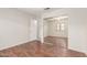Bedroom featuring wood floors and mirrored closet at 280 W Sheffield Ave, Gilbert, AZ 85233