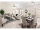 Bright living room featuring neutral furniture, tile flooring, and a ceiling fan at 280 W Sheffield Ave, Gilbert, AZ 85233