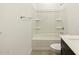 Well-lit bathroom showcasing a modern shower-tub combo at 37139 W Prado St, Maricopa, AZ 85138
