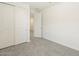 Neutral bedroom featuring a closet and neutral carpeting at 37139 W Prado St, Maricopa, AZ 85138