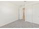 Neutral bedroom featuring a closet and neutral carpeting at 37139 W Prado St, Maricopa, AZ 85138