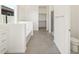 Bright bathroom featuring a shower and a tub at 37154 W La Paz St, Maricopa, AZ 85138