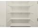 Spacious walk-in closet offers plenty of room for storage with multiple shelves at 37154 W La Paz St, Maricopa, AZ 85138