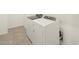 Laundry room showing side-by-side washer and dryer at 37154 W La Paz St, Maricopa, AZ 85138
