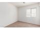 Carpeted bedroom featuring a large window offering lots of natural light at 3728 W Fremont Rd, Phoenix, AZ 85041