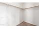 Walk-in closet with wall mounted closet system at 3728 W Fremont Rd, Phoenix, AZ 85041