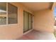 Covered patio with sliding glass doors and view of the backyard offering a perfect outdoor retreat at 3728 W Fremont Rd, Phoenix, AZ 85041