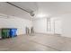 Spacious garage with ample room for storage and parking, featuring a garage door opener at 3728 W Fremont Rd, Phoenix, AZ 85041