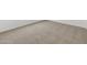 Close up of neutral, comfortable carpet flooring in a bedroom at 37385 W San Sisto Ave, Maricopa, AZ 85138