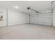 Spacious two-car garage with ample room for vehicles and storage at 37385 W San Sisto Ave, Maricopa, AZ 85138