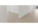 Bright and airy living room with clean, white walls and wood-look tile floors at 37385 W San Sisto Ave, Maricopa, AZ 85138
