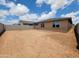 Expansive backyard space, perfect for creating your outdoor oasis with ample room for recreation and gardening at 37399 W San Sisto Ave, Maricopa, AZ 85138