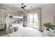 Bright bedroom features a bunk bed, geometric rug, and large window for ample natural light at 3927 E Sheila Ln, Phoenix, AZ 85018