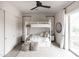 Bright bedroom features a bunk bed, geometric rug, and a view to the outside at 3927 E Sheila Ln, Phoenix, AZ 85018