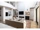 Bright living room with fireplace, soaring ceilings, and open concept design at 3927 E Sheila Ln, Phoenix, AZ 85018