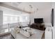 This living room features an open floorplan with stylish decor and a comfortable seating arrangement at 3927 E Sheila Ln, Phoenix, AZ 85018