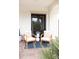 Cozy patio seating area with stylish chairs, a patterned rug, and an outdoor entry at 3927 E Sheila Ln, Phoenix, AZ 85018