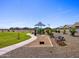 The community playground offers play equipment and a grassy space for residents at 4181 W Lisa Ln, San Tan Valley, AZ 85144
