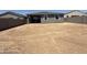 View of the home's backyard with block wall fencing at 4521 S 95Th Dr, Tolleson, AZ 85353